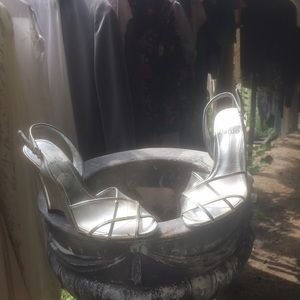 Size 4.5 metallic Silver and Clear wedge Slides